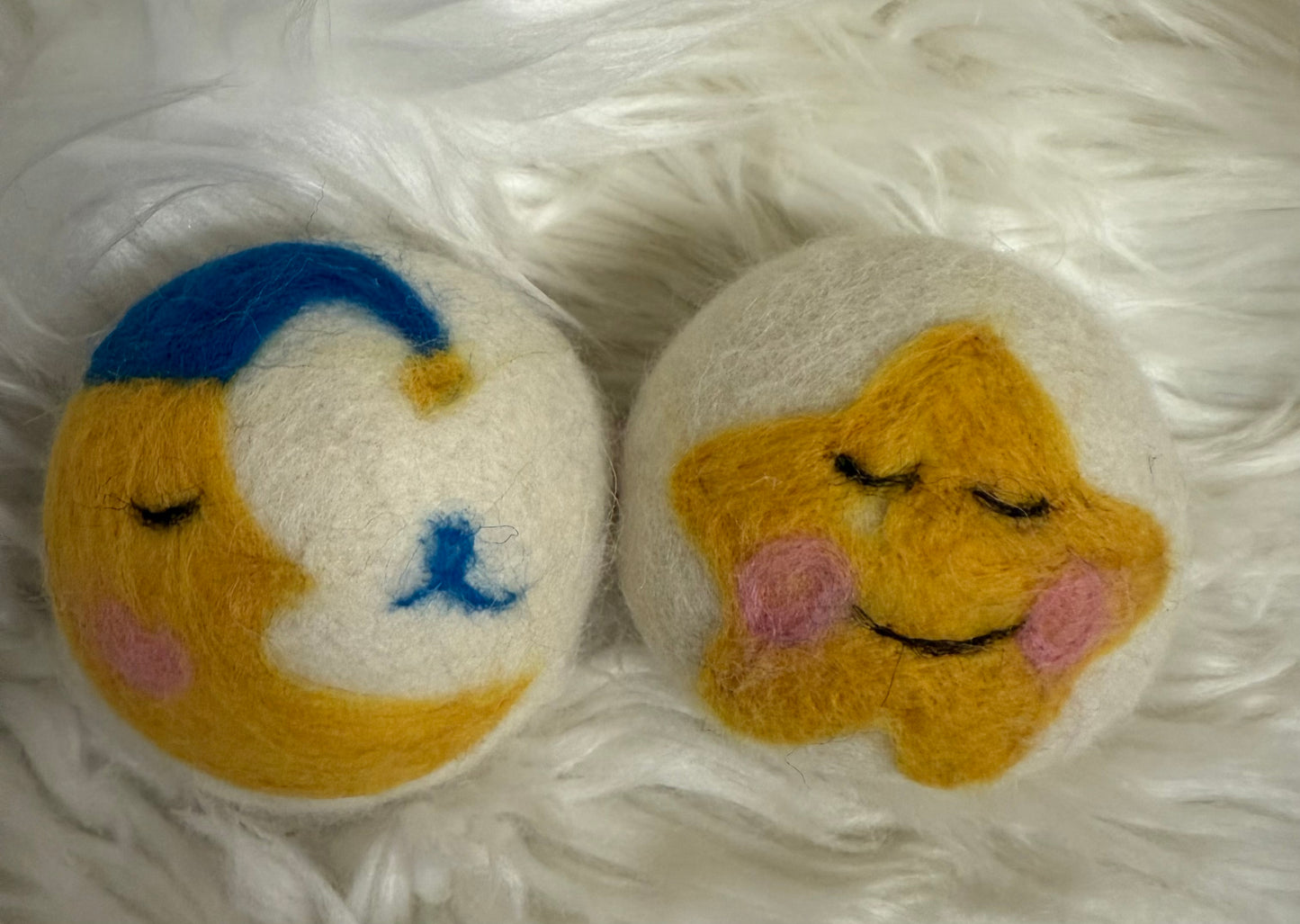 Felted wool laundry dryer balls: sleepy moon and sun